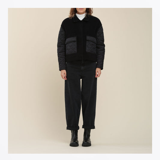 Model wearing Humility coat