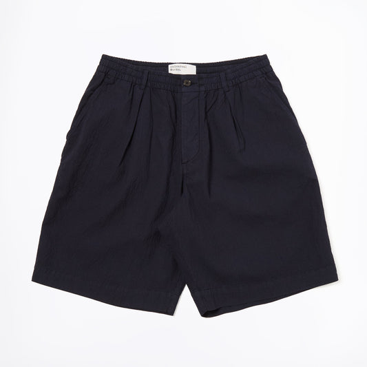 - Pleated Track Short in Navy Seersucker II
