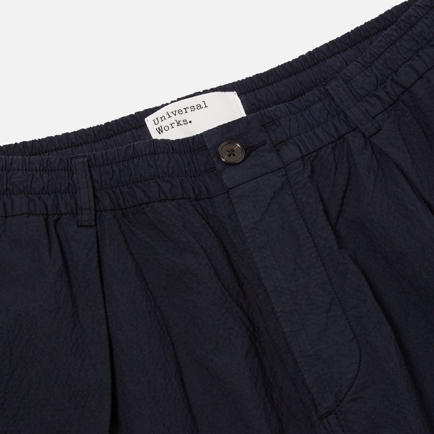 - Pleated Track Short in Navy Seersucker II