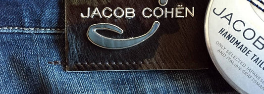Display of Jacob Cohen brown jean logo