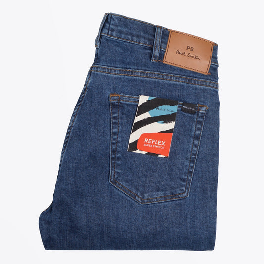 - Reflex Stretch Tapered Jeans - Mid Wash Denim