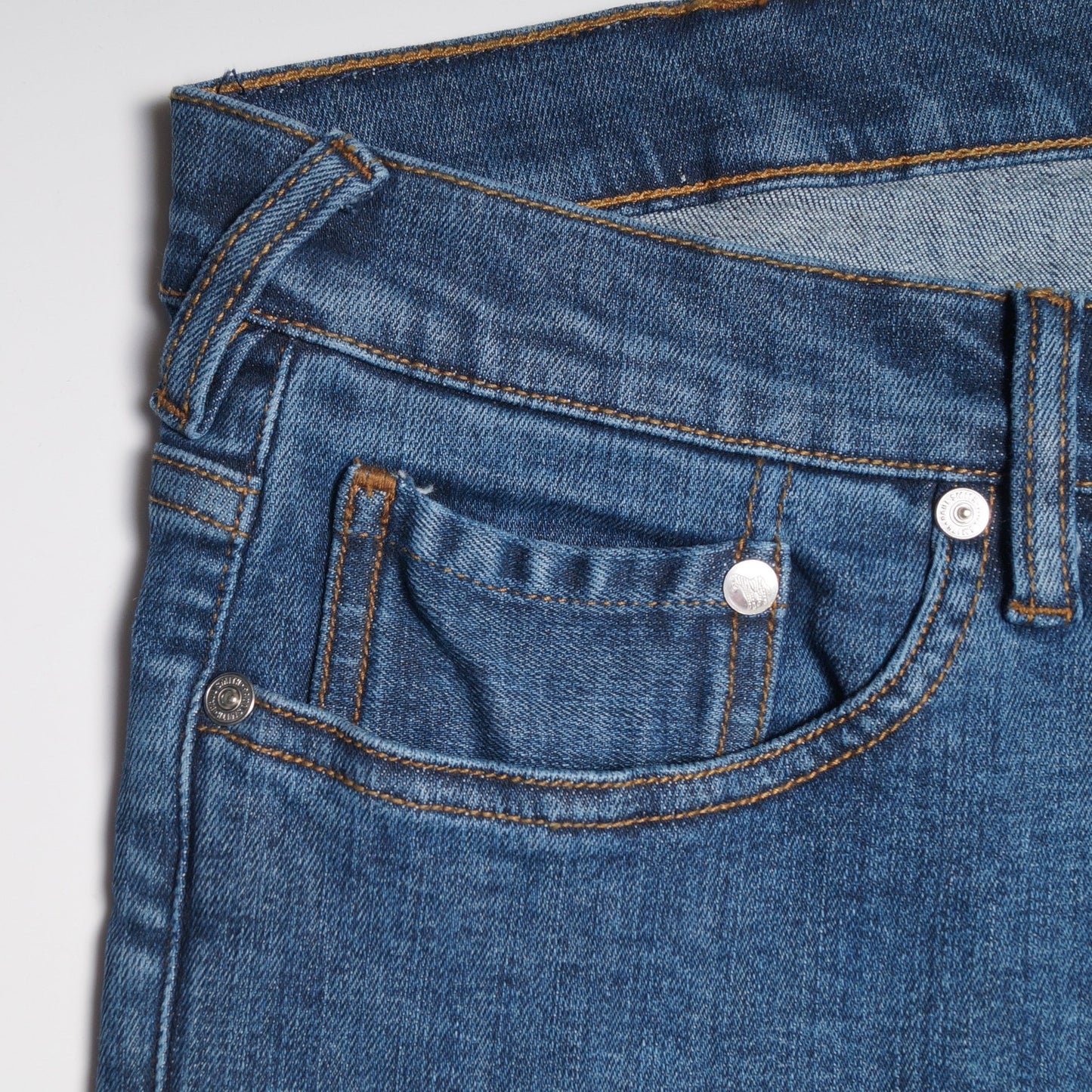 - Reflex Stretch Tapered Jeans - Mid Wash Denim