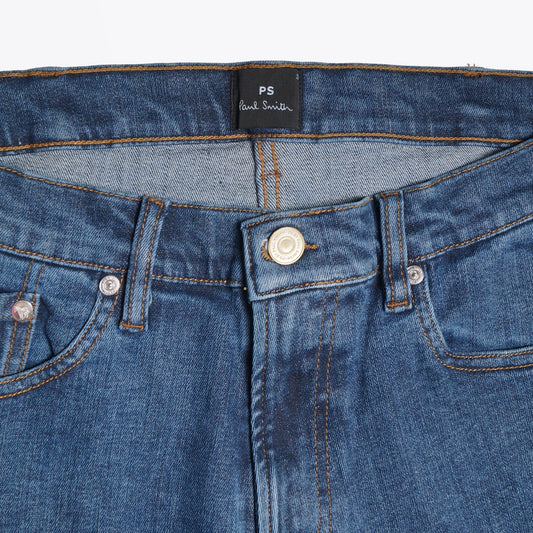 - Reflex Stretch Tapered Jeans - Mid Wash Denim