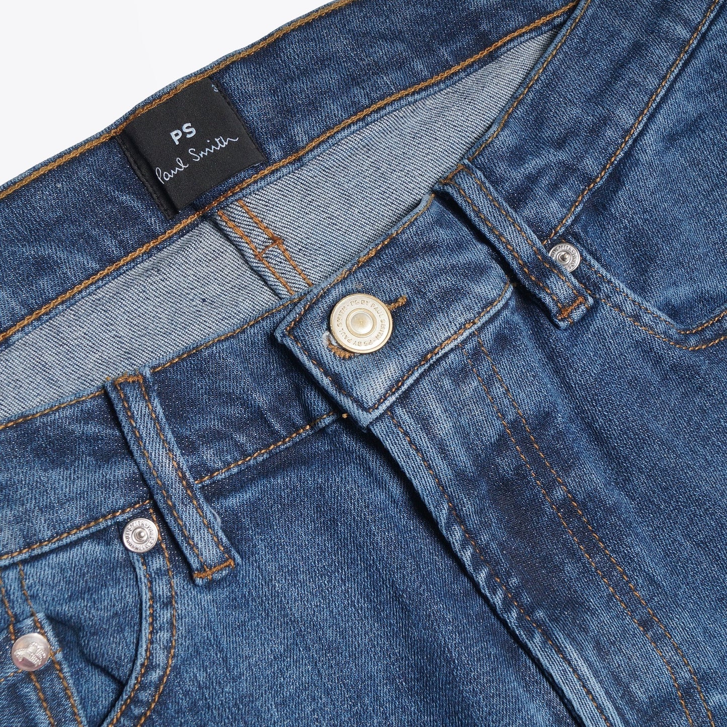 - Reflex Stretch Tapered Jeans - Mid Wash Denim