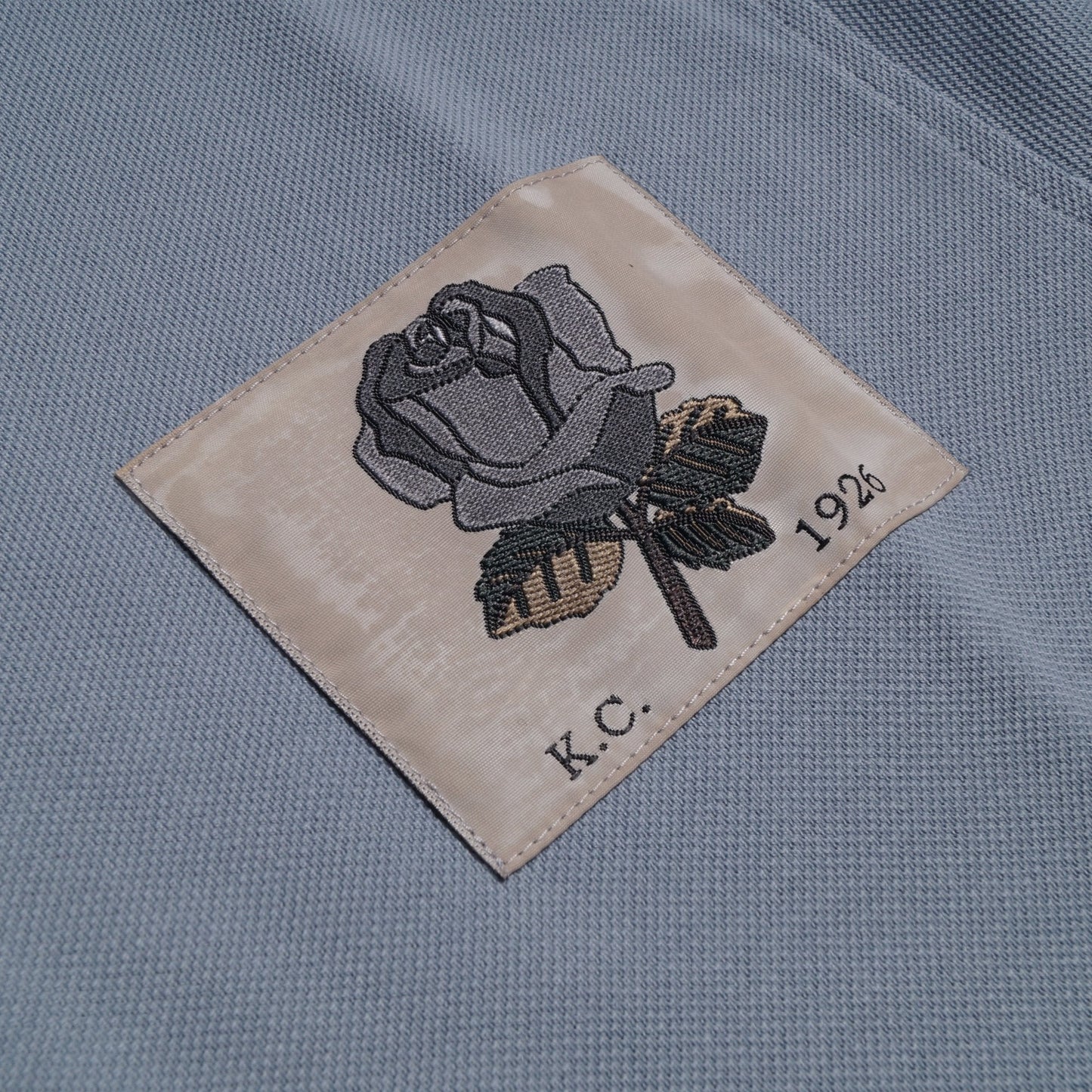 - Rose Patch Polo Shirt - Blue