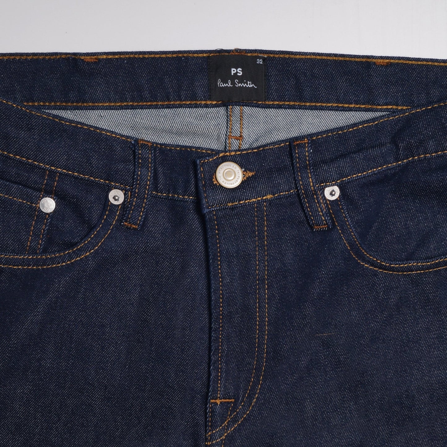 - Tapered Cotton Reflex Jeans - Indigo