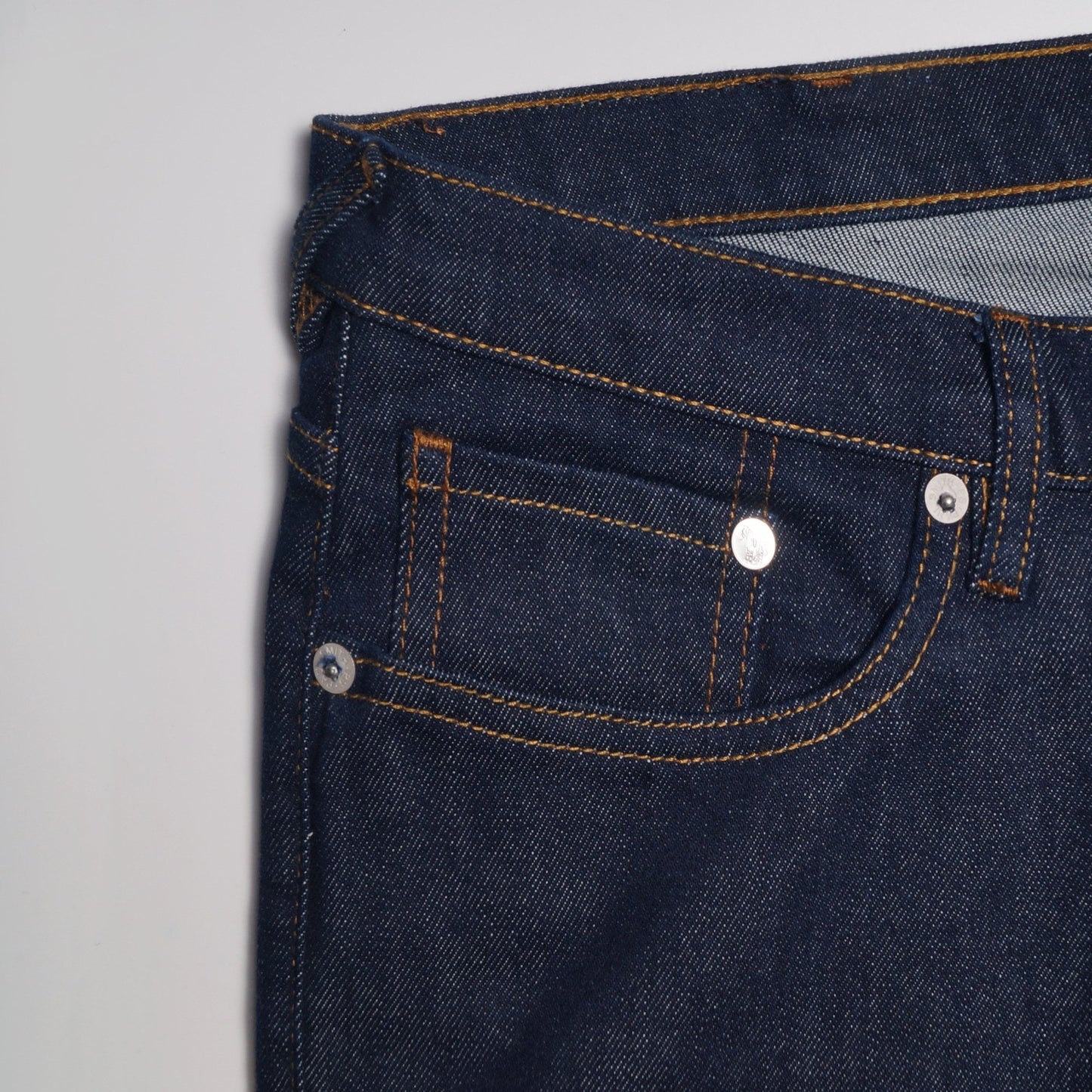 - Tapered Cotton Reflex Jeans - Indigo