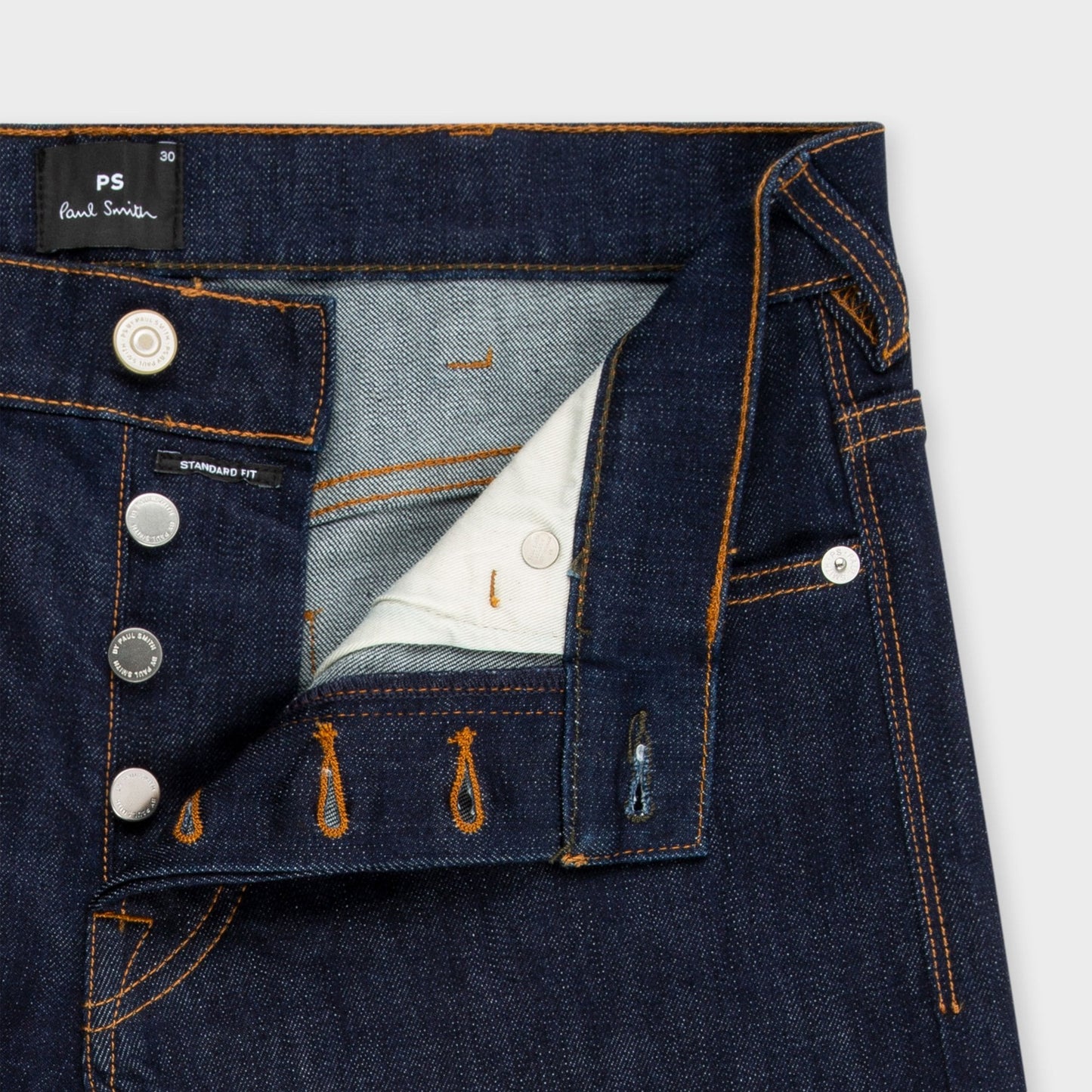 - Tapered Fit Stretch Jeans - Indigo